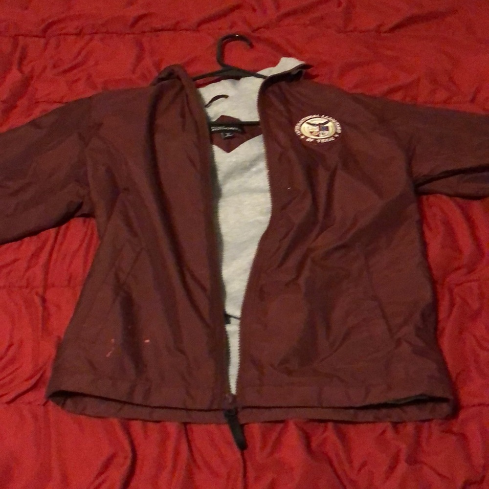 Usedinternational leadership of Texas windbreaker